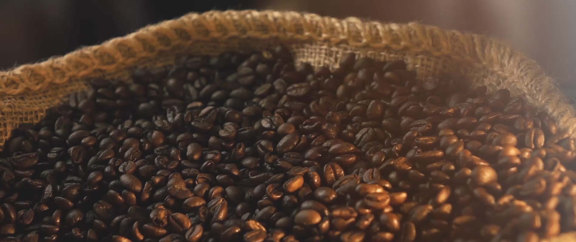 fresh coffee beans in a wicker basket